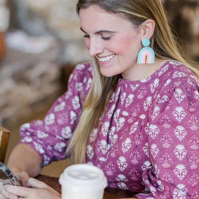 Model wearing Aqua Rainbow Clay Earrings.