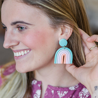 Model wearing Aqua Rainbow Clay Earrings.